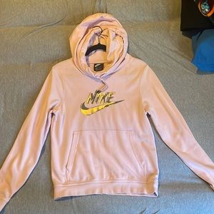Light Pink nike hoodie, gold + grey nike logo